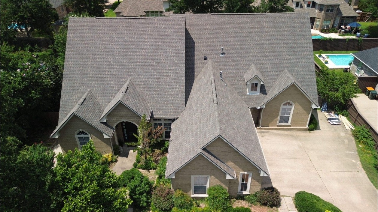 Completed residential shingle roofing project by JR Roofing